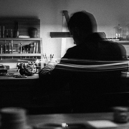 A person working at a workbench